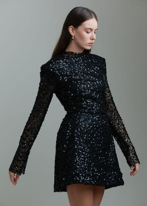 Kratka haljina Martiz sa šljokicama i dugim rukavima